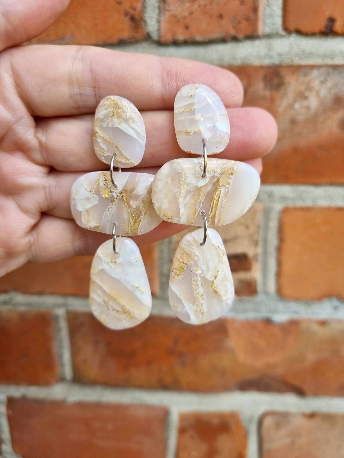 Gennemsigtig hvid/guld - ørestikker