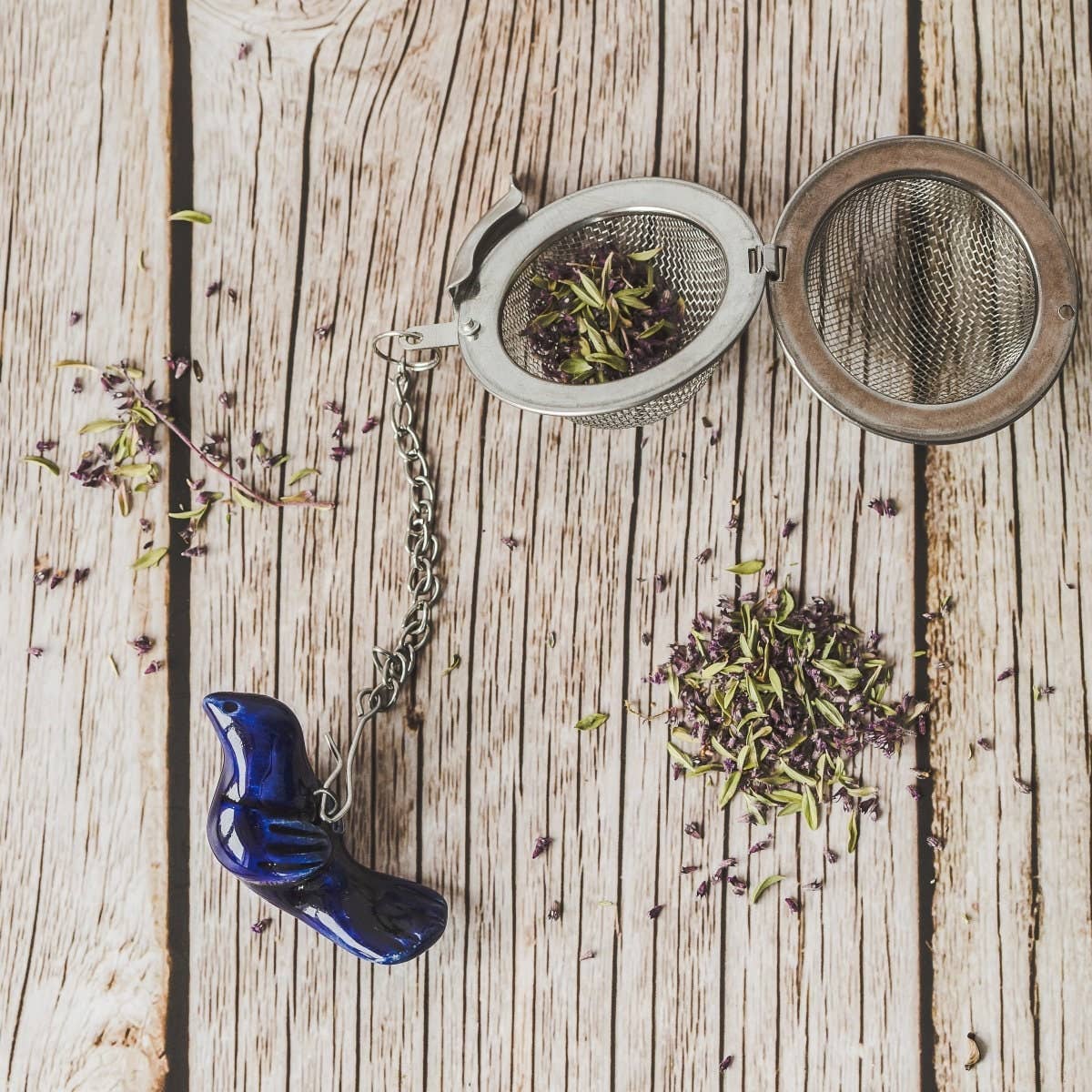 Håndlavet teæg med keramisk blå fugl 🐦