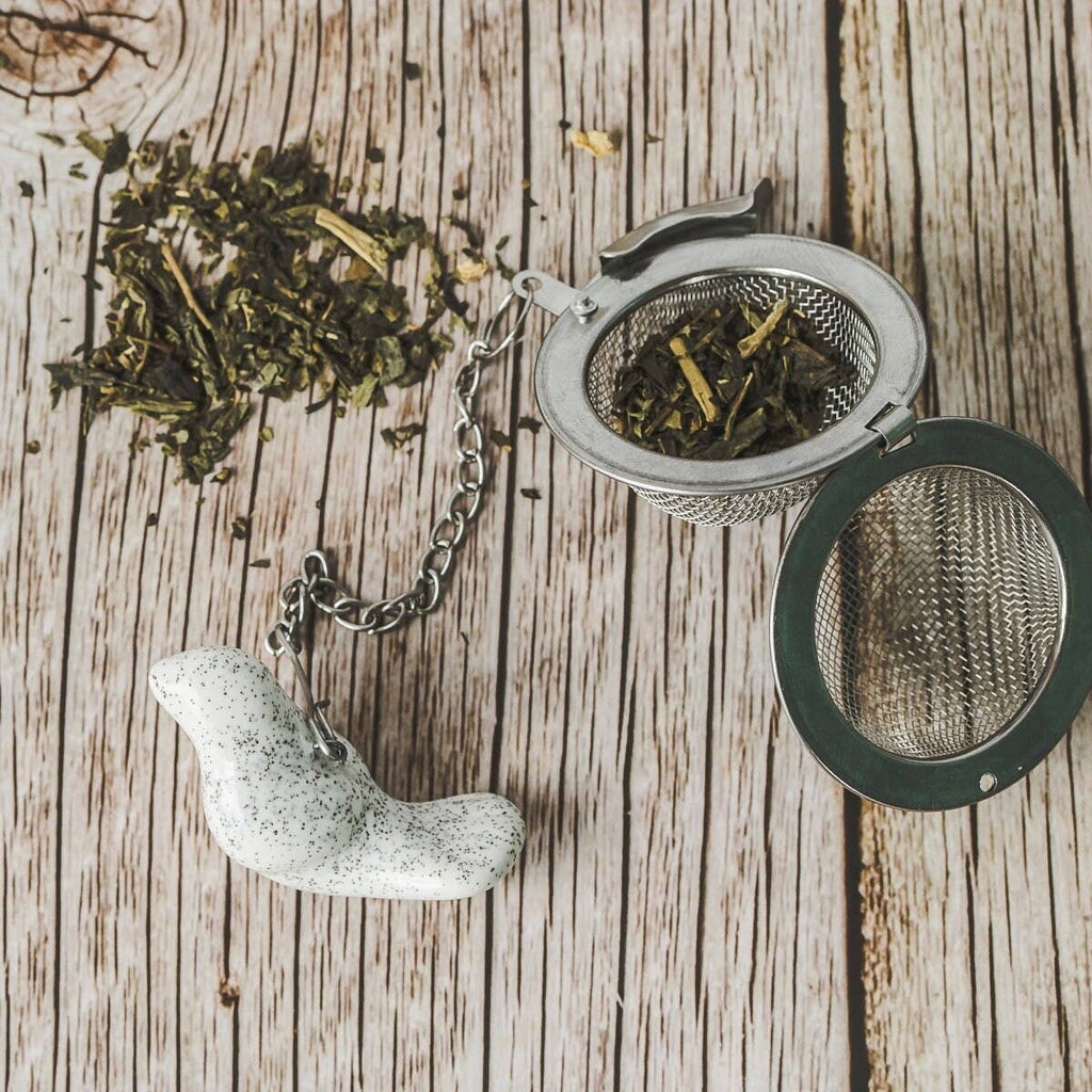 Håndlavet teæg med keramisk hvid fugl 🕊️