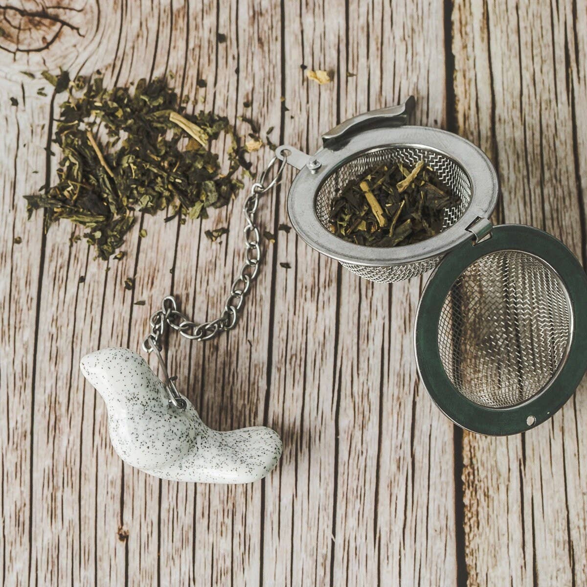 Håndlavet teæg med keramisk hvid fugl 🕊️