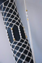 Håndlavet net til yogamåtte – med gyldne detaljer