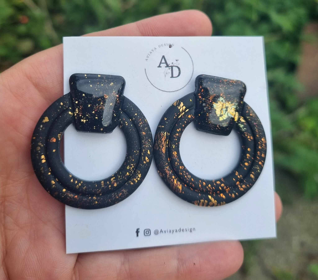 Sort rund metallic - ørestikker