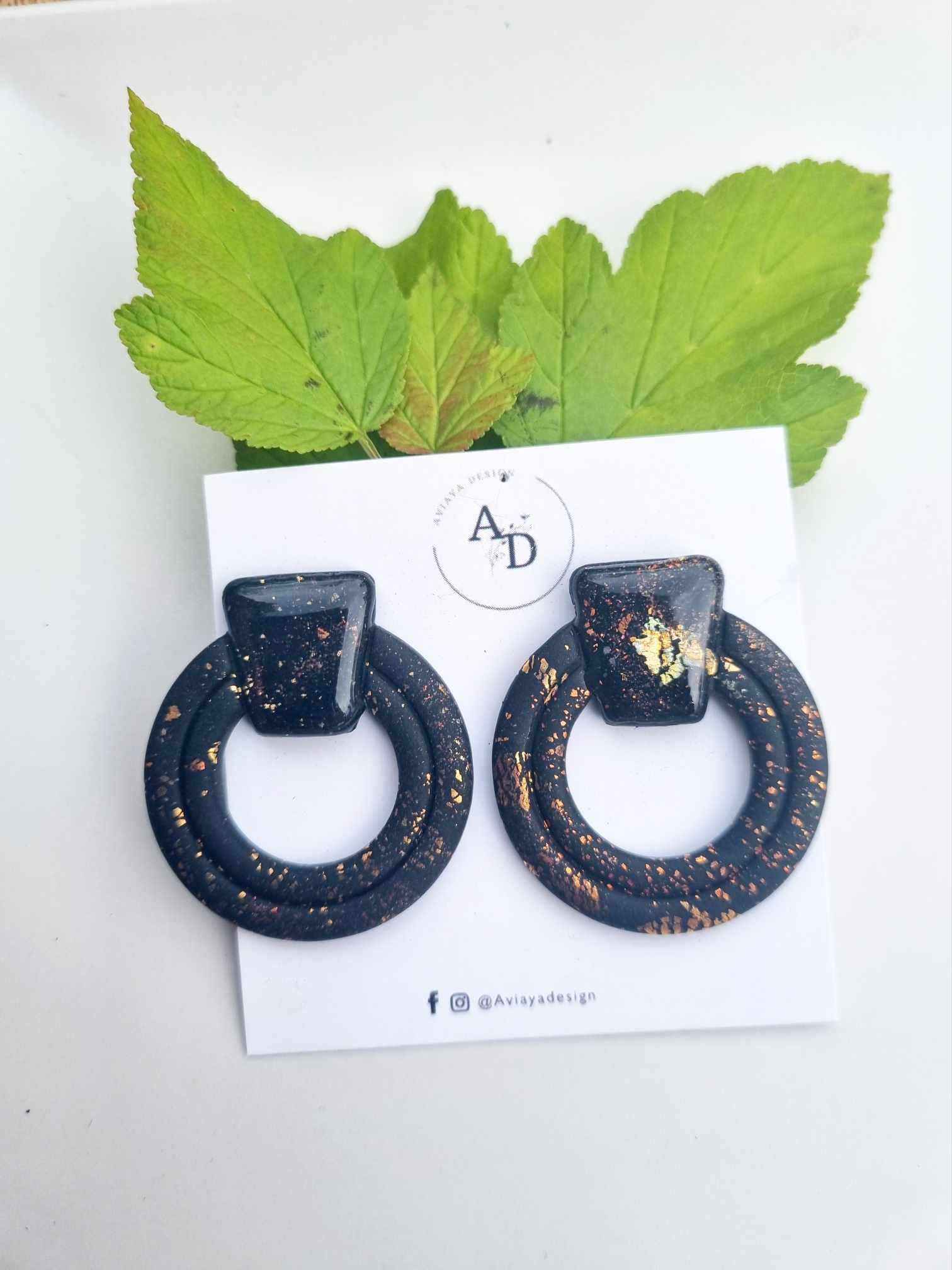 Sort rund metallic - ørestikker