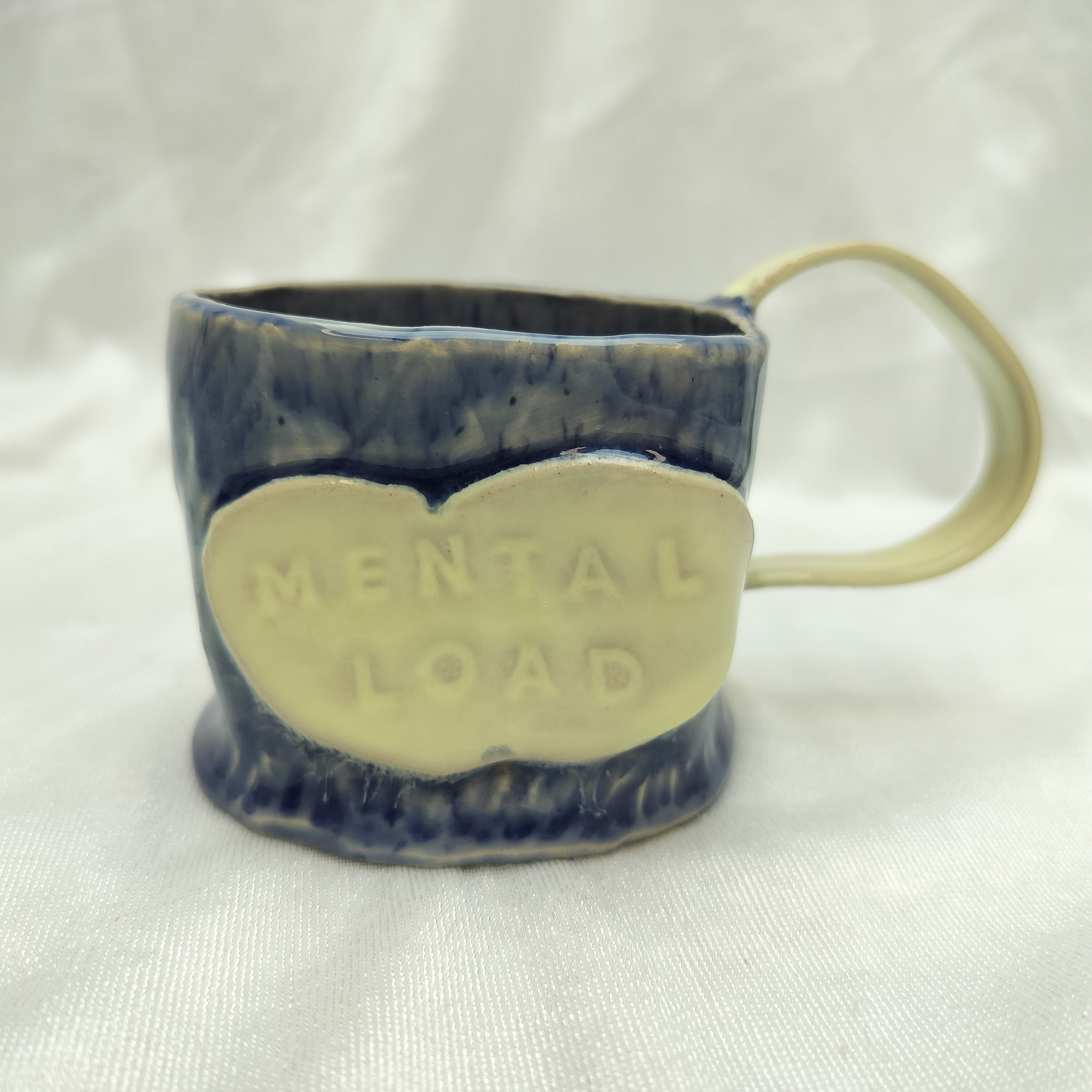 Krus "Mental load" – Finurligt keramik med kant og budskab